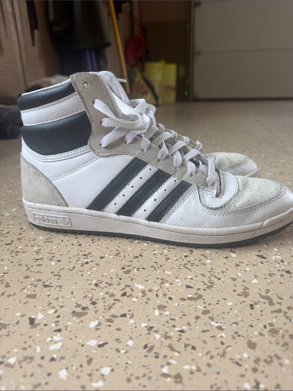 adidas Men’s White High-Top Sneakers with Black Stripes